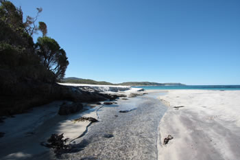 Waterfall Beach, water across the beach